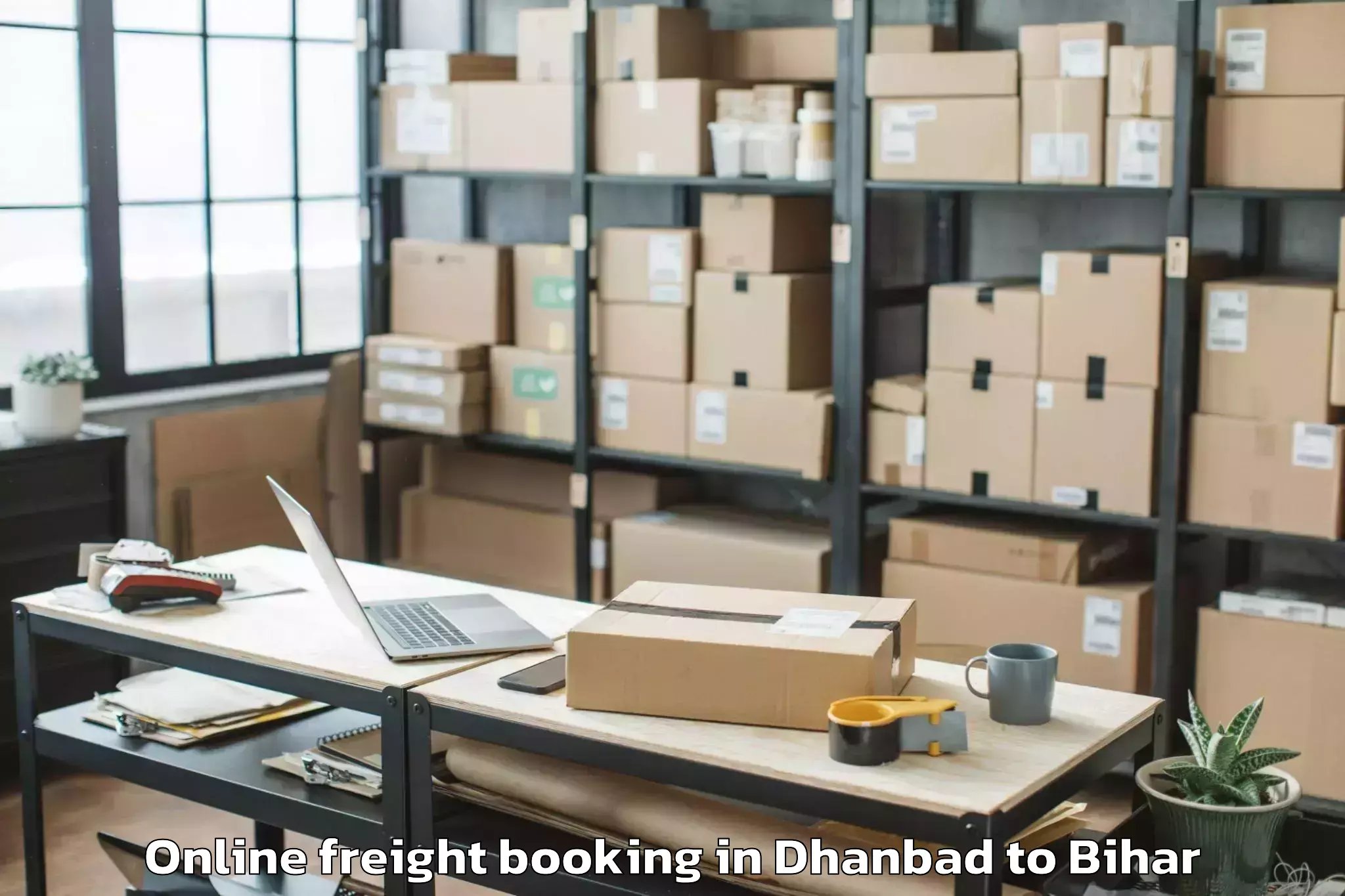 Professional Dhanbad to Banmankhi Online Freight Booking